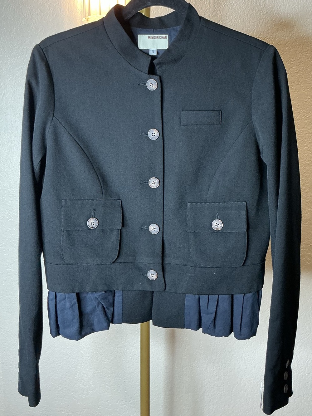 Moncler Gamme Bleu Black Cropped Button-Front Jacket with Navy Pleated Hem